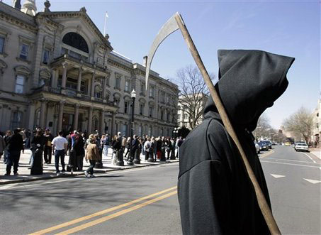 Grim Reaper in the street outside a funeral home