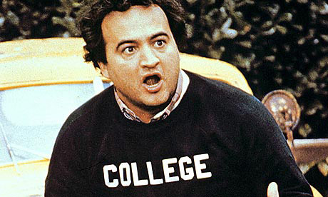 John Belushi wearing a "College" sweatshirt in Animal House movie