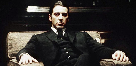 Michael Corleone relaxing in a chair