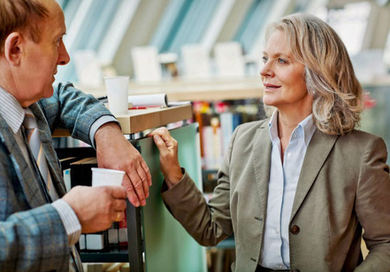 Male and female professors flirting