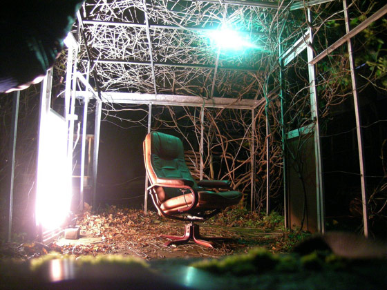 Single black chair at a psych ward at night 