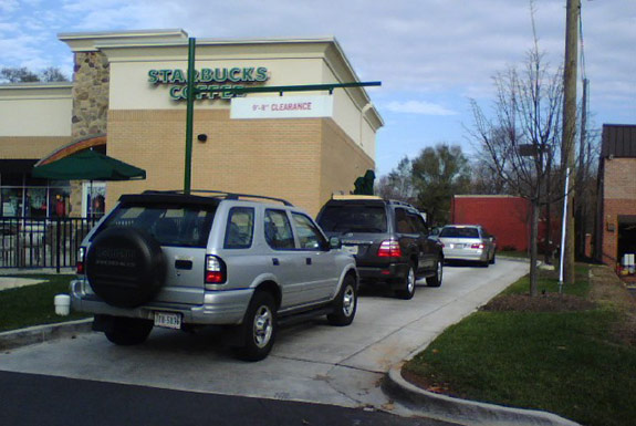 Cars lined up in a Starbucks drive-thru