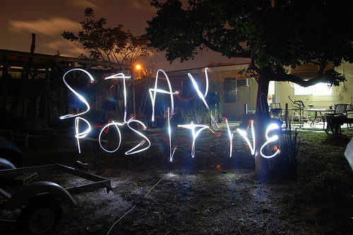 Stay positive message in front yard