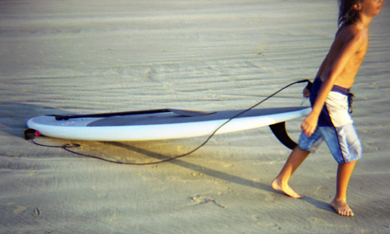 Surfboard taxi boy in Hawaii