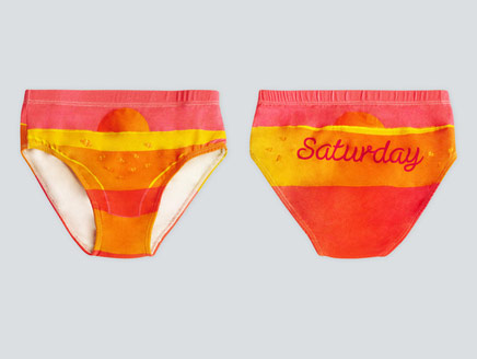 Two pairs of underwear with "Saturday" written on one