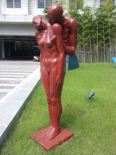 Dorm statue of couple having sex