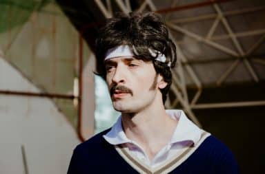 Man wearing retro white headband
