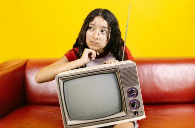 Sitcom teen on sofa