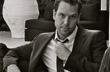 Dane Cook wearing a suit