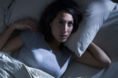 Woman can't fall asleep in bed