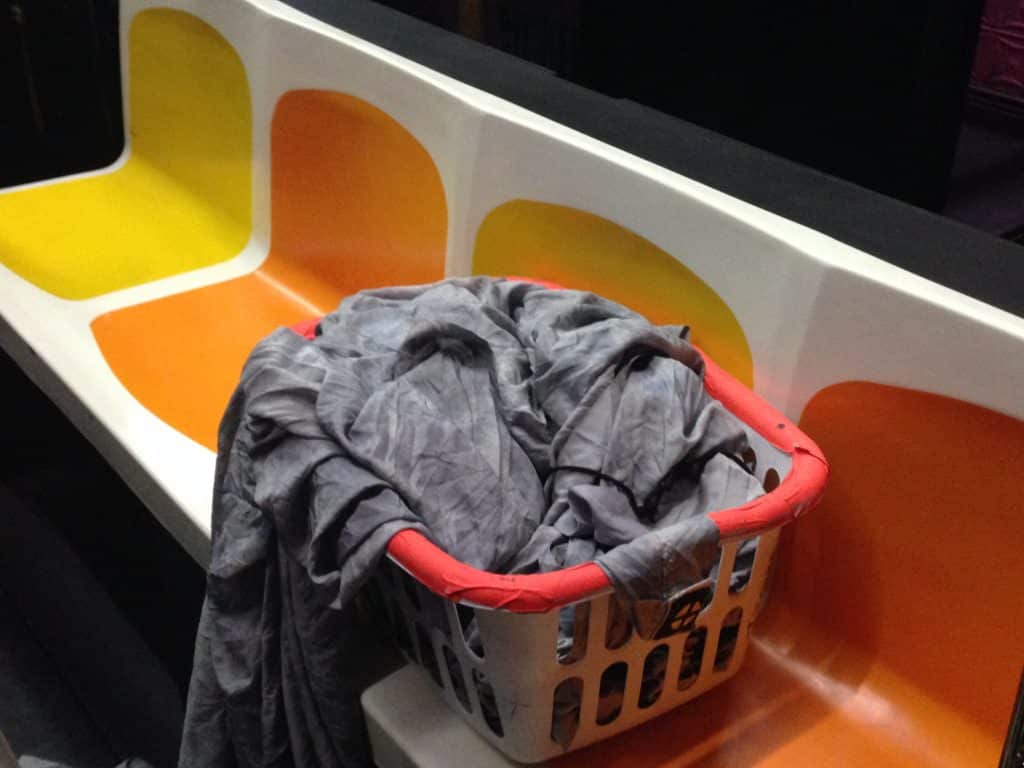 Laundry basket on empty subway train