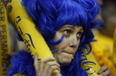 Woman crying at an NBA game