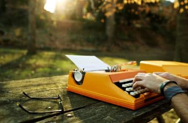 Orange typewriter outside