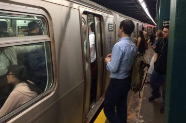 Crowded New York City subway train car