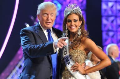 Donald Trump hugging Miss USA