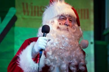 Santa Claus with a microphone