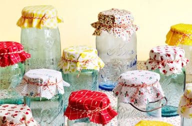 Mason jars with cloth pattern tops