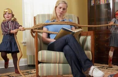 Kids tying up a babysitter with rope