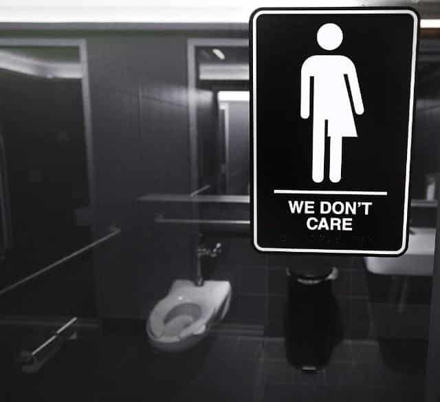 We Don't Care - bathroom sign