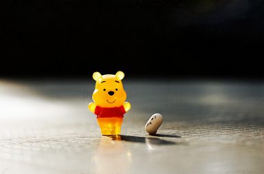 Winne the Pooh gummi bear with a pill