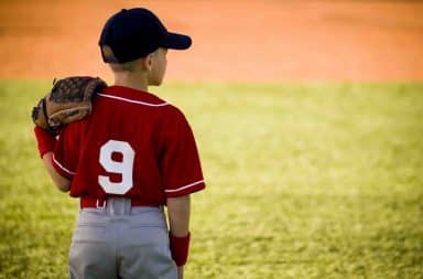 Boy pitcher in baseball league