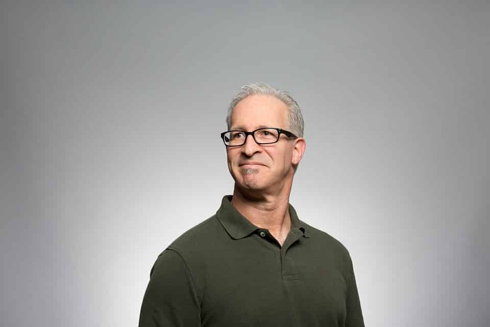 Adult baby boomer white male wearing glasses