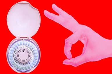 Birth control pill pack being flicked by a hand