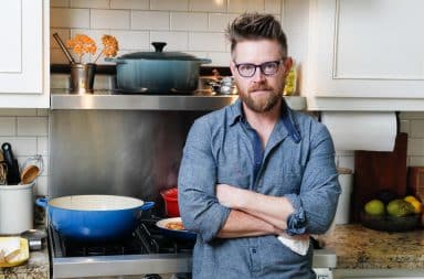 Husband mad in the kitchen cooking