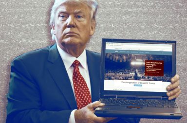 Donald Trump opening a laptop