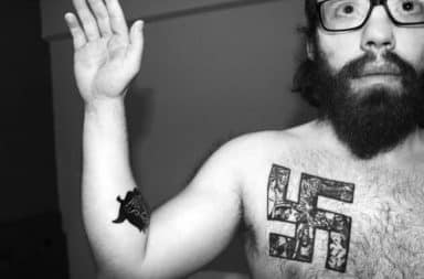 White man with Swastika tattoo