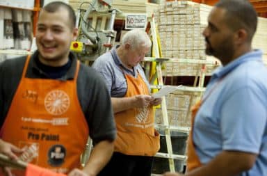 Home Depot employees working in the store