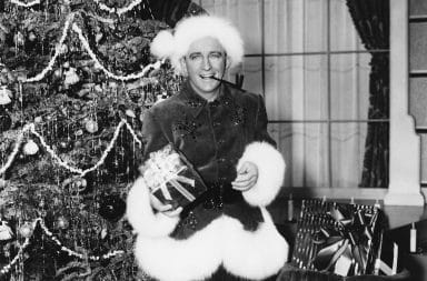 Bing Crosby in White Christmas wearing Santa Claus outfit