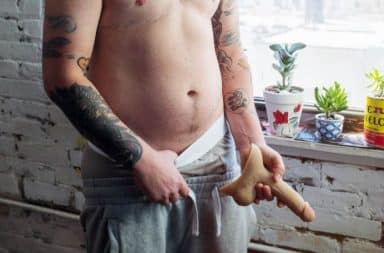 Man holding his penis