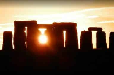Sun shining through Stonehenge