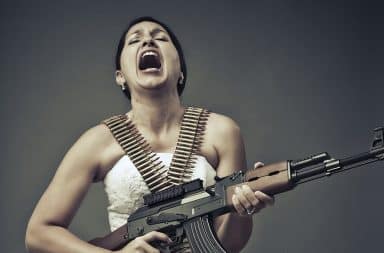 Bride screaming while holding AK-47
