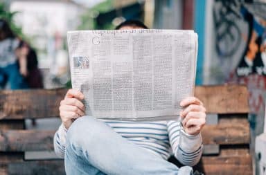 A man reads the paper.