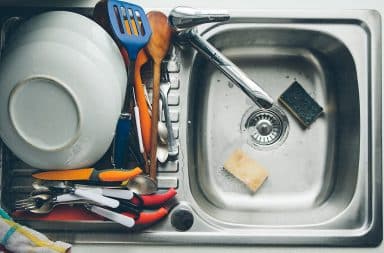 utensils in the sink, being dirty