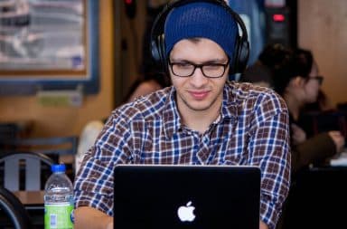 Man wearing headphones at tech startup