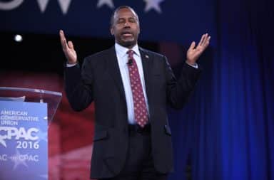 Ben Carson hands up in the air