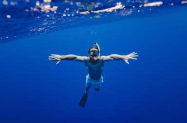 Man snorkeling underwater