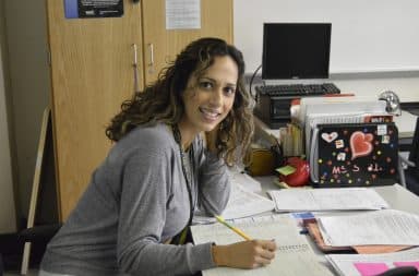 University professor at a desk