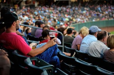 Sad fan in a seat at the baseball game