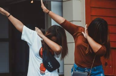 Two women dabbing