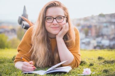 Woman on grass reading