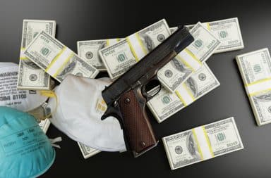 money guns and masks