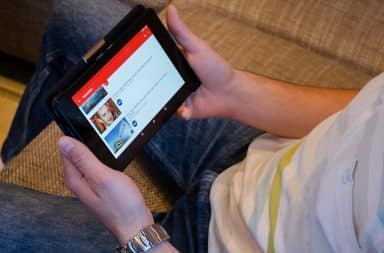 Dad holding a tablet computer