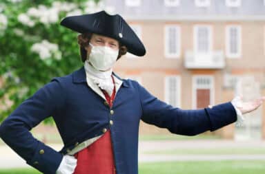 Colonial Williamsburg re-enactor wearing a face mask