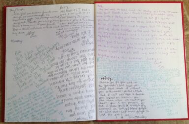People writing in a high school yearbook