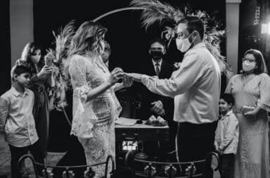 Pandemic wedding ceremony guests wearing masks