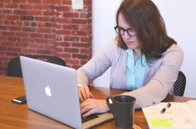 Woman writing an email signature